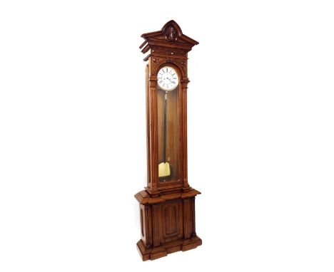 German oak floor standing eight day regulator clock, the 9" white dial with subsidiary seconds dial, within an architectural 