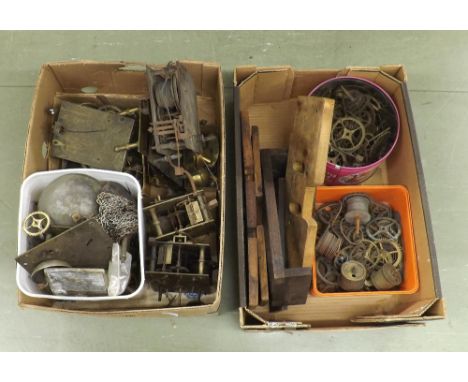 Large quantity of longcase clock related items, including several old movements, false plates, seat boards and movement parts