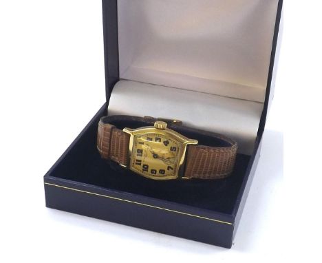 Rare Patek Philippe 1920s 18k tonneau cased gentleman's wristwatch, the gilded dial with Arabic numerals and subsidiary secon