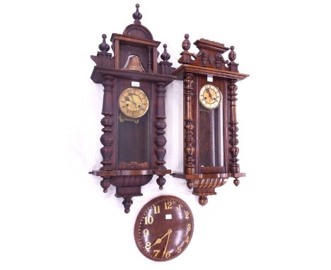 Stained pine Vienna style two train regulator wall clock, the 5" buff chapter ring enclosing a gilded centre, within a glazed