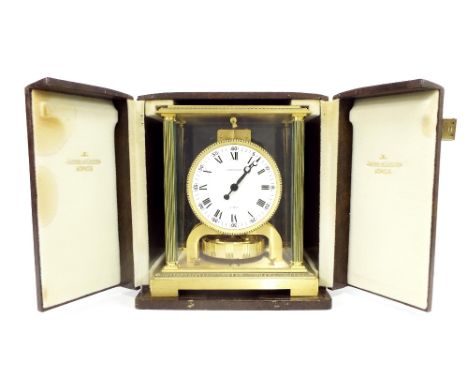 Jaeger-LeCoultre Atmos clock, the 4.25" white dial within a pillared stepped gadrooned gilded case with Perspex panels, no. 4