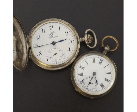 Invar silver lever hunter pocket watch within a decorative engraved foliate case, 50mm; together with a silver cylinder engin