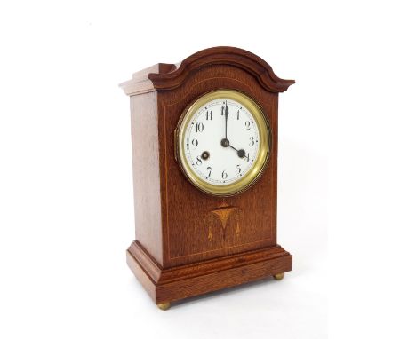 Junghans mahogany inlaid two train mantel clock, the 4.5" white dial within an inlaid stepped arched case, 13.5" high (pendul