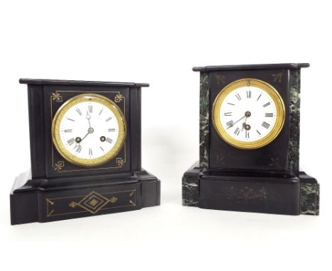 Small black slate two train mantel clock striking on a bell, the 3.5" white dial within a breakfront stepped case, 8" high; a