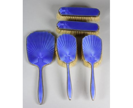 A silver and enamel five piece dressing table set, Birmingham 1932, with blue guilloche enamel decoration, comprising , hand 