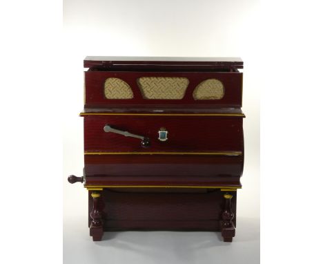 A Spanish Faventia barrel organ, in the form of a piano, playing 6 tunes on a 27cm barrel, together with 3 other barrels, 42 