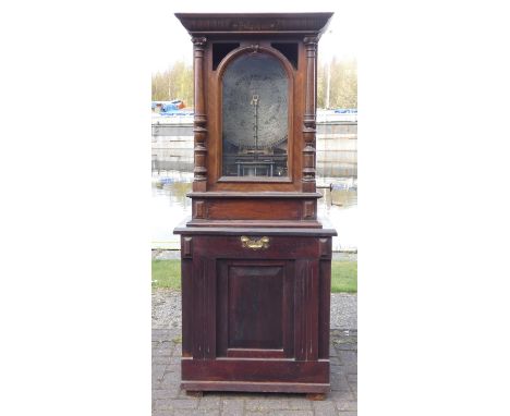 A large Polyphon music penny operated automaton, Model 104, c.1880, with 9 records, the two-part case in walnut and walnut ve