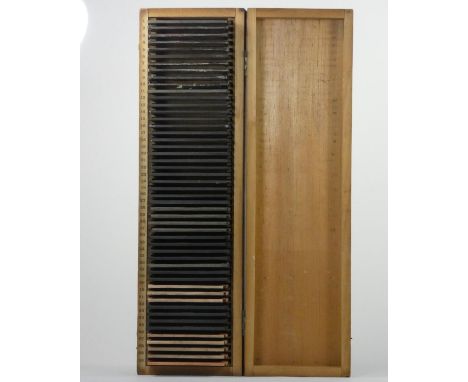 A collection of 50 Magic Lantern slides, depicting cartoon and nursery rhymes, case. 