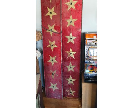 A pair of red and gold star illuminated panels, 226cm and a W. Button &amp; Co arcade game stand, c.1950/60's, plaque verso, 