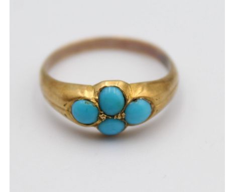 A Victorian gold and turquoise quatrefoil ring, size O 1/2 and a n Edwardian emerald and diamond five stone ring, size M (2).