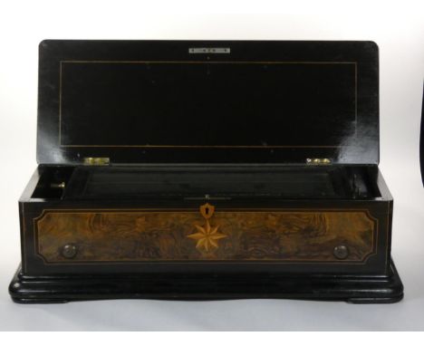 A 19th century swiss music box in burr walnut and ebonised case, with 2 comb movement numbered 16630, 57 x 22 x 17 cm, workin