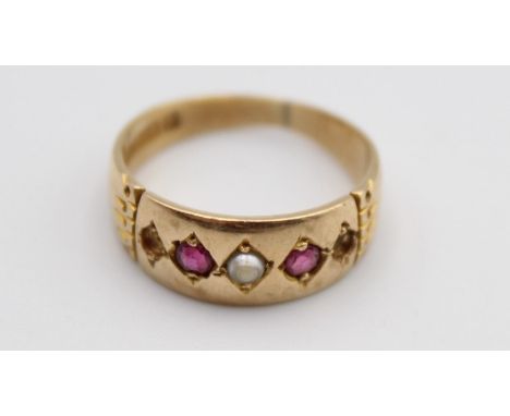 A Victorian 15ct gold, ruby and half pearl ring, Chester 1889, lacking two pearls, size M, 3.5 gms. 