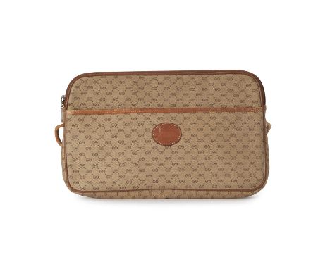 Gucci, a vintage handbag, featuring the maker's micro monogram canvas exterior with tan leather trim, front slip pocket with 