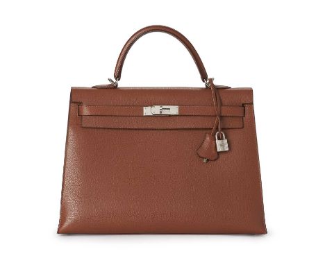 Hermes, a 2006 Kelly Sellier 35 handbag, crafted from tan pebbled leather, with Palladium plated hardware, featuring a single