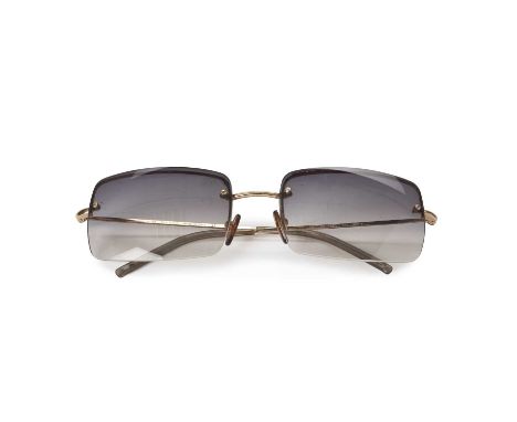 Gucci, a pair of sunglasses, featuring rectangular-shaped gradient lenses and thin gold-tone metal arms, no. GG1653, with mak