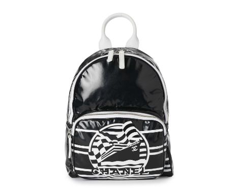 Chanel, a La Pausa backpack, featuring a black and white printed vinyl exterior, with a front zip pocket, looping leather top