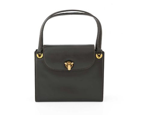 Gucci, a vintage leather handbag, crafted from smooth brown box calf leather, with gold-tone hardware, dual top handles, fron