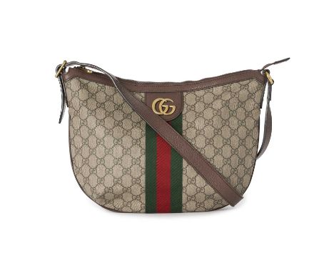 Gucci, an Ophidia messenger bag, crafted from the maker's supreme GG coated canvas, with brown leather trim, adjustable leath