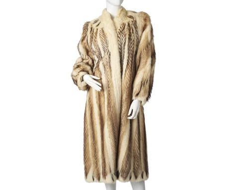 A fitch and mink fur coat, designed with a Mandarin collar, hook and eye clip fastenings, barrel sleeves with fitted cuffs, t