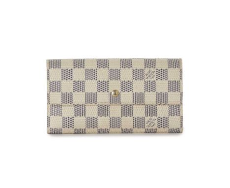 Louis Vuitton, a Porte Tresor International wallet, designed with a damier azur coated canvas exterior, featuring a front fla