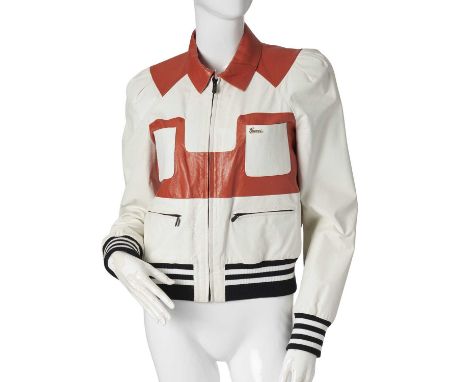Gucci, a 1990s leather jacket, crafted from cream and orange leather, featuring black and white elasticated trim, with four e