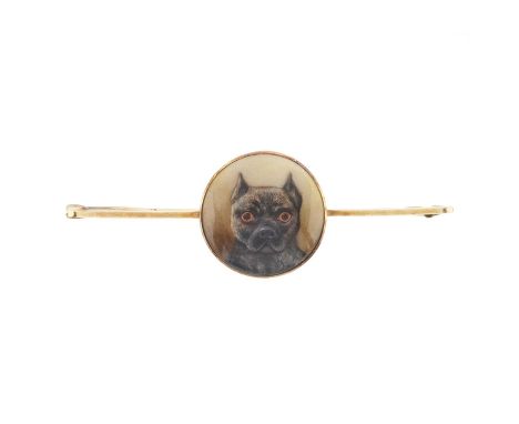 William Bishop Ford (attributed), a gold polychrome enamel portrait of a dog, atop a 15ct gold bar brooch, bar stamped 15ct, 