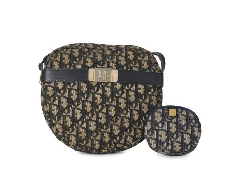 Christian Dior, a vintage Trotter handbag and purse, featuring a blue monogram canvas exterior, with smooth blue leather trim