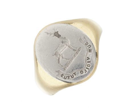 An early 20th century 18ct gold intaglio seal signet ring, depicting the Gordon-Canning family crest and motto 'Dum Vigilo Tu
