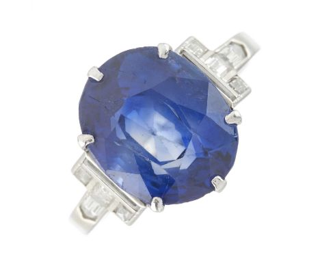 An Art Deco platinum Sri Lankan sapphire ring, with calibre-cut diamond geometric shoulders, with verbal report from The Gem 