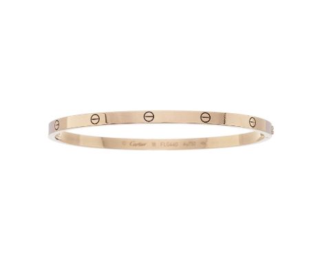Cartier, an 18ct rose gold Love bangle bracelet, with screw head motif highlights, signed Cartier, serial FLG440, stamped Au7