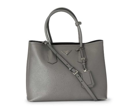 Prada, a Double Tote, featuring a grey saffiano leather exterior with contrasting smooth black leather lining, dual looping l
