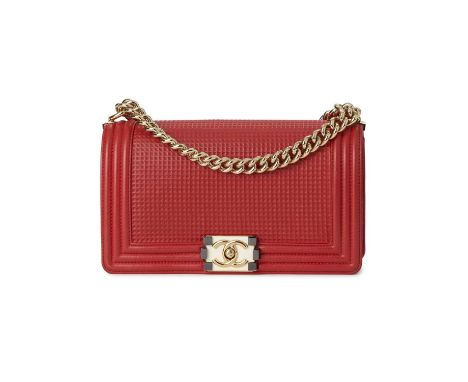 Chanel, a Medium Cube Embossed Boy handbag, crafted from red leather, designed with a cube embossed exterior and ribbed borde