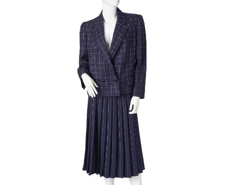 Celine, a 1980s vintage navy wool skirt suit, comprising a navy blue, red and white plaid blazer, with single double-breasted