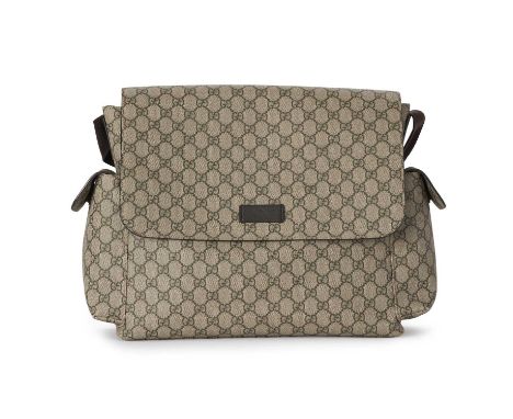 Gucci, a GG Supreme baby changing bag, crafted from GG monogram coated canvas with brown leather trim, featuring two exterior