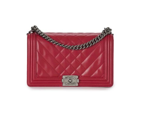 Chanel, a New Medium Boy handbag, crafted from hot pink lambskin leather, featuring a diamond and chevron quilted exterior, a