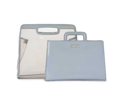 Gucci, a bag with vinyl cover, featuring a clear vinyl exterior with blue leather trim and cut-out top handles, together with