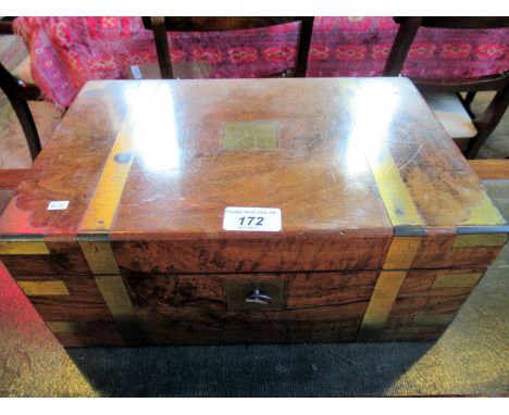 A late Victorian walnut and brass bound writing slope, having interior tooled leather scriber, twin inkwell and pen tray, 23c