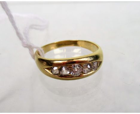 A late Victorian graduated half-hoop diamond ring, the mixed old cut diamonds claw mounted within 18ct gold band.   Condition