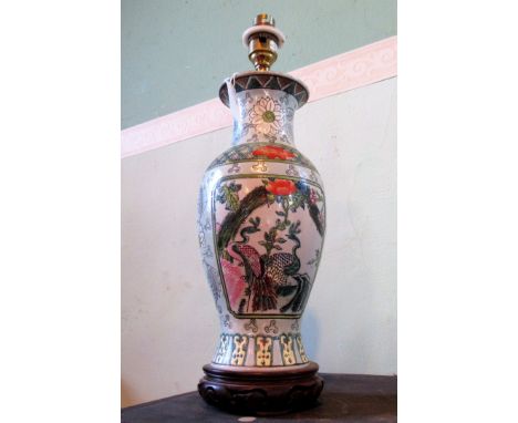 A baluster table lamp, decorated in the Chinese manner, 38cm.