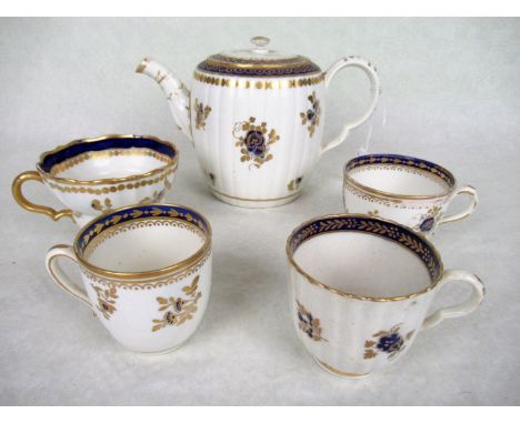 A Caughley reeded teapot, late 18th century, together with four assorted Caughley tea and coffee cups, each in the Dresden Fl