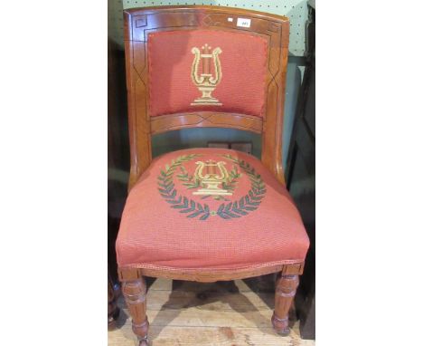 An oak tapestry upholstered chair, 47cm wide.