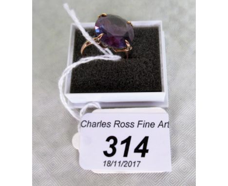 A 14ct gold amethyst set ring, the large cushion shaped stone in claw mount.   Condition Report:  Ring size - approx. K 1/2Ma