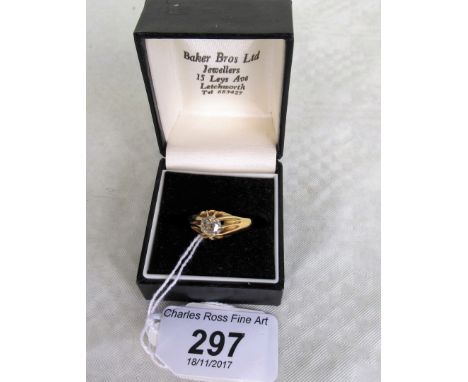 A gentleman's single stone diamond ring, old brilliant cut in raised and pierced claw mount to a plain 18ct gold shank.   Con