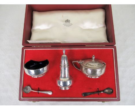 Asprey: a boxed three piece silver cruet set, London 1966.