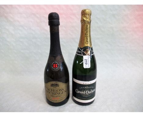 A bottle of Canard-Duchene Champagne, 750ml, together with a bottle of Schloss Bochingen sparkling wine, 0.75ltrs.