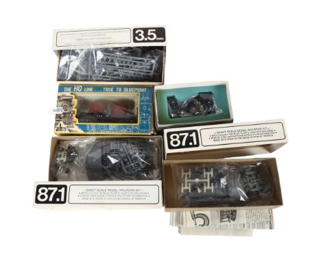 An AHM HO gauge Old Time tank car, in original box, model 6241, 2 x Titchy Train Group 22 foot wood ore cars, a Titchy Train 