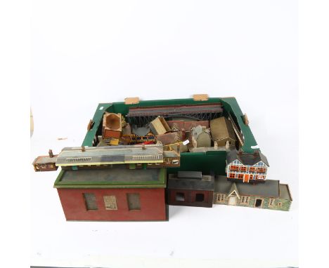 A large quantity of Vintage model railway buildings, many wooden and plastic items, various out-buildings, some appear to be 