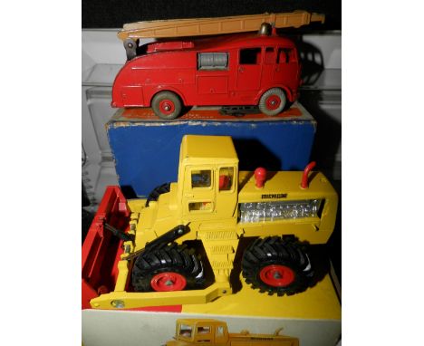 Dinky 555 fire engine with scarce brown ladders and Dinky 976 Michelin tractor good/boxes good