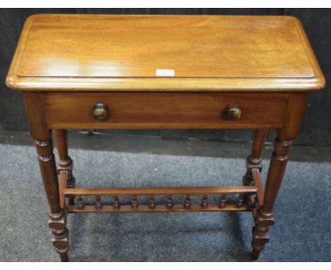 A Victorian mahogany hall table of small proportions, moulded top,single drawer to frieze, button handles,turned legs,spindle