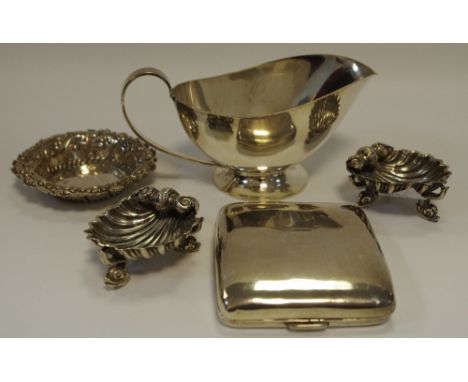 A silver bowed rectangular cigarette case, 3.4oz;   a pair of silver shell shaped salts;  a silver pin dish;  etc (5) 5.89oz 